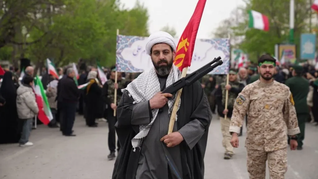 gunmullah Religious leader carrying gun.